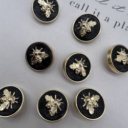 Пуговицы черные с золотистыми мухами, 25 мм