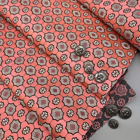 Жаккард неонового кораллового цвета с геометрически рисунком