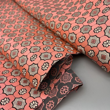 Жаккард неонового кораллового цвета с геометрически рисунком