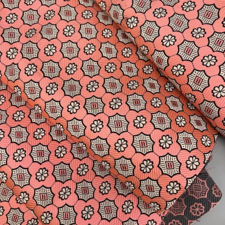 Жаккард неонового кораллового цвета с геометрически рисунком