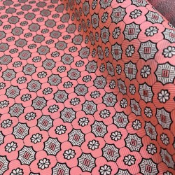 Жаккард неонового кораллового цвета с геометрически рисунком