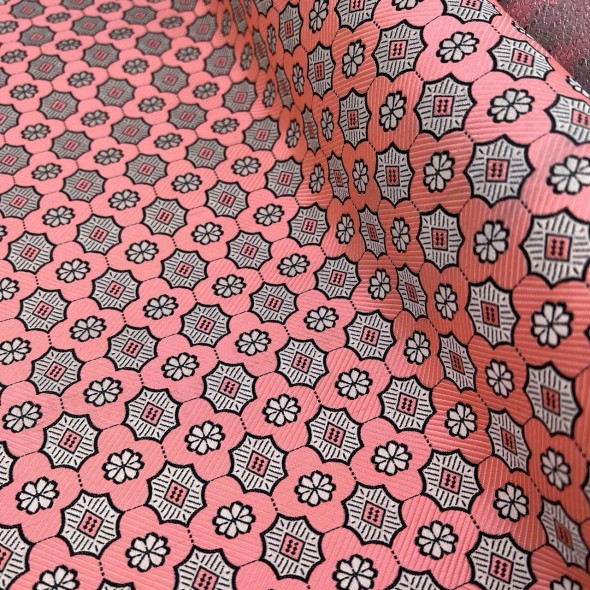 Жаккард неонового кораллового цвета с геометрически рисунком