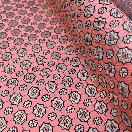 Жаккард неонового кораллового цвета с геометрически рисунком