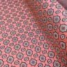 Жаккард неонового кораллового цвета с геометрически рисунком