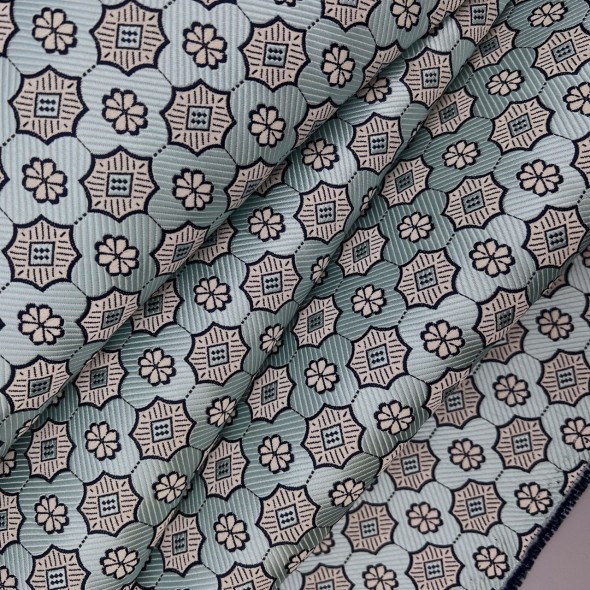 Жаккард мятного цвета с геометрически рисунком