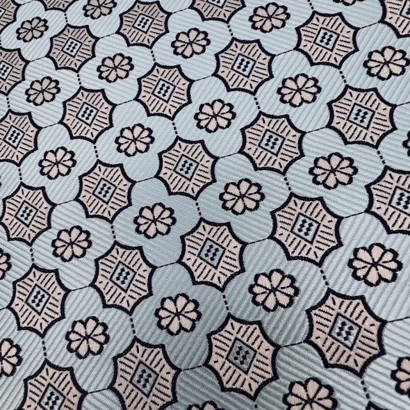 Жаккард мятного цвета с геометрически рисунком