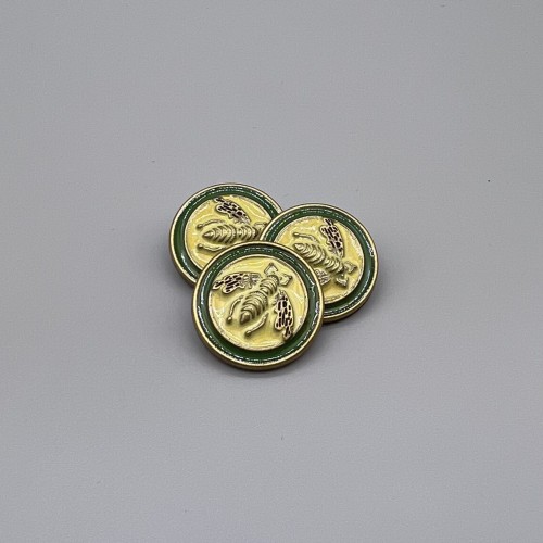 Пуговицы металлические с зелено-желтой эмалью