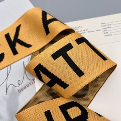 Тесьма трикотажная жаккардовая с текстом, оранжевая