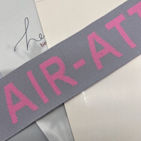 Тесьма трикотажная жаккардовая с текстом, светло-серая