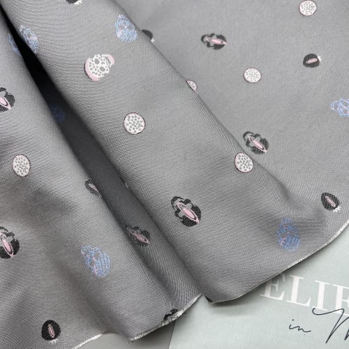 Жаккард светло-серый с мелкими черепами по всему полотну