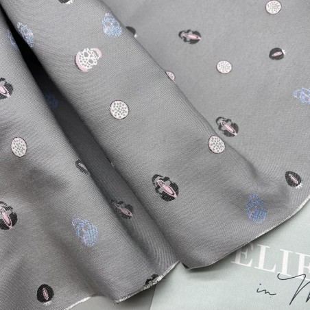 Жаккард светло-серый с мелкими черепами по всему полотну