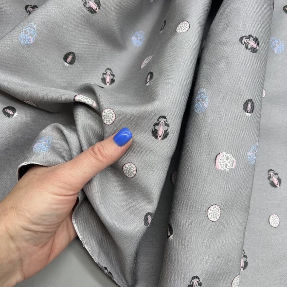 Жаккард светло-серый с мелкими черепами по всему полотну