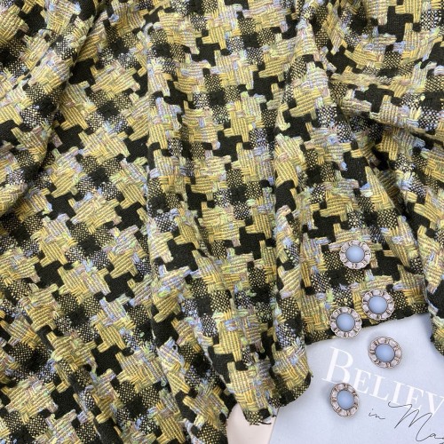 Ткань твид с шерстью в травянисто-зеленых тонах.