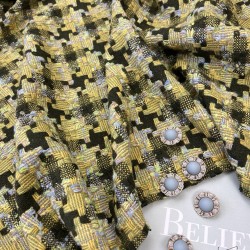 Ткань твид с шерстью в травянисто-зеленых тонах.