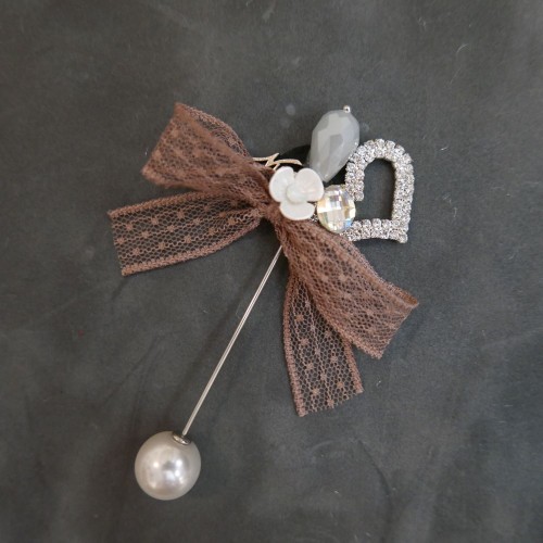 Брошь металлическая с кружевным бантом 2