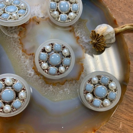 Пуговицы прозрачные с голубыми вставками и серебристым металлом