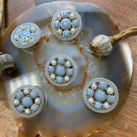 Пуговицы прозрачные с голубыми вставками и серебристым металлом