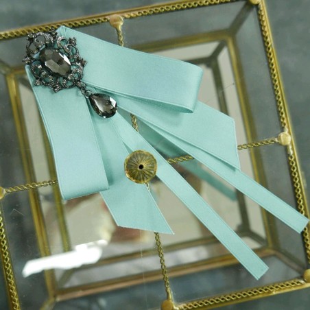 Мятный бант-брошь на булавке