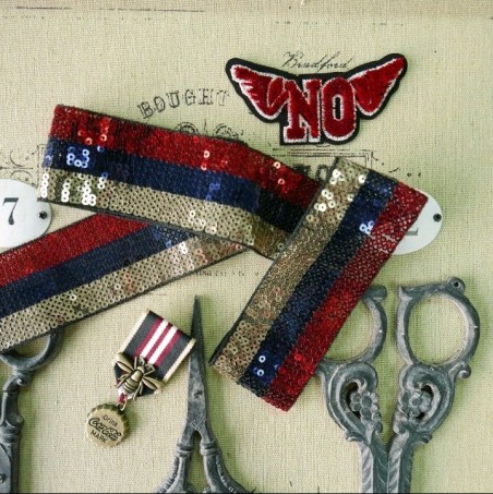 Тесьма с пайетками на сетке