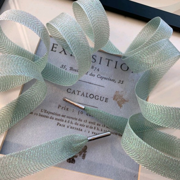 Шнурки прозрачные светло-зеленые для декорирования одежды