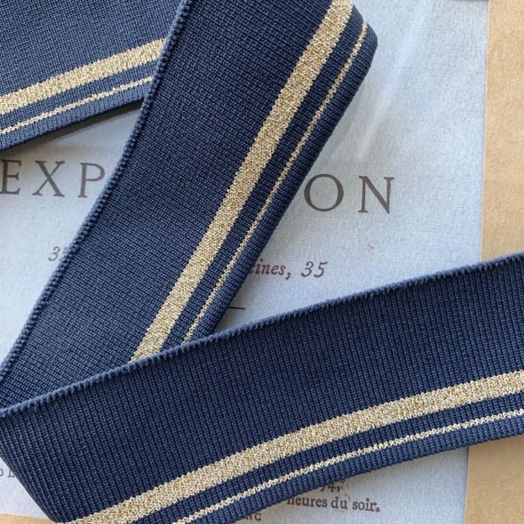 Довязы трикотажные джинсового цвета с золотистыми полосками