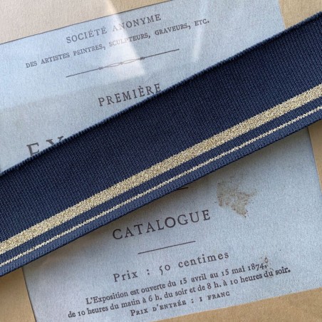 Довязы трикотажные джинсового цвета с золотистыми полосками