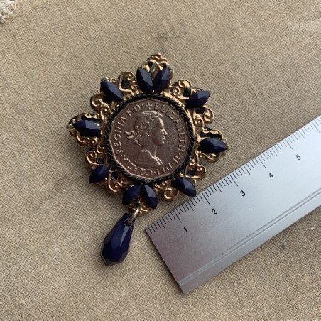 Брошь золотистая с синим декором