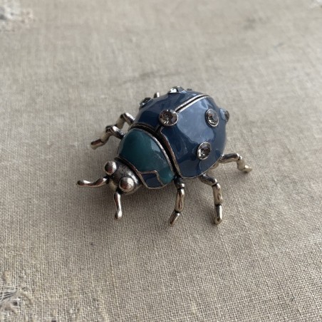 Брошь жук серебристый с синей эмалью и стразами