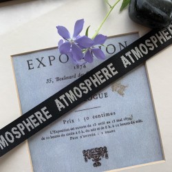 Репсовая лента с серебристым текстом Atmosphere