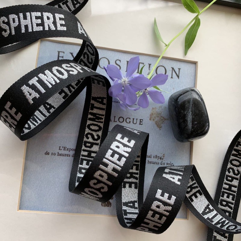 Репсовая лента с серебристым текстом Atmosphere