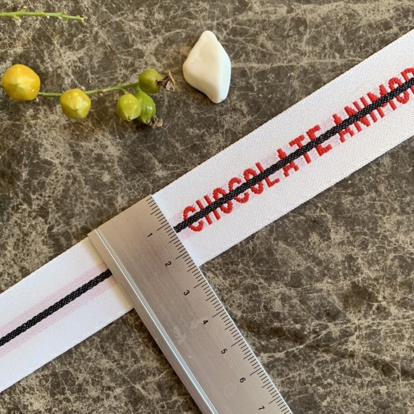 Тесьма репсовая жаккардовая белая с текстом, ширина 2.5 см