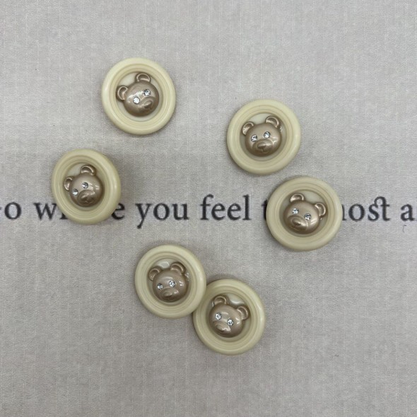 Пуговицы пластик на ножке молочные с золотистыми мишками, 25 мм