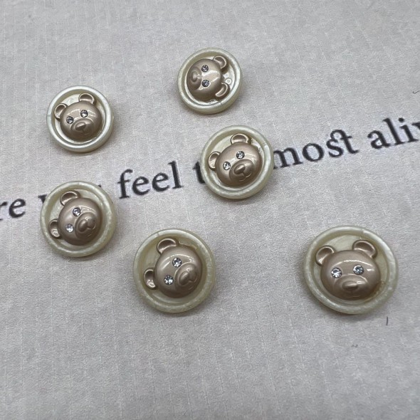 Пуговицы пластик на ножке молочные с золотистыми мишками, 18 мм