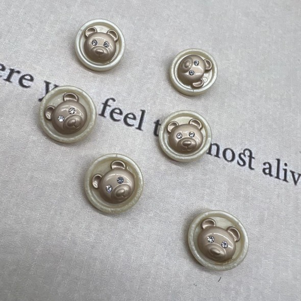Пуговицы пластик на ножке молочные с золотистыми мишками, 18 мм