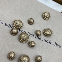 Пуговицы метал легкий матовое золото с бантиками, 23 мм