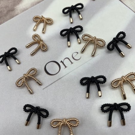 Пуговицы метал на ножке в виде бантиков золотистого цвета, 23 мм