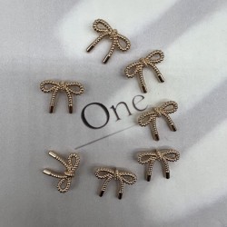 Пуговицы метал на ножке в виде бантиков золотистого цвета, 23 мм