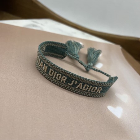 Браслет текстильный цвета темной мяты с кисточками