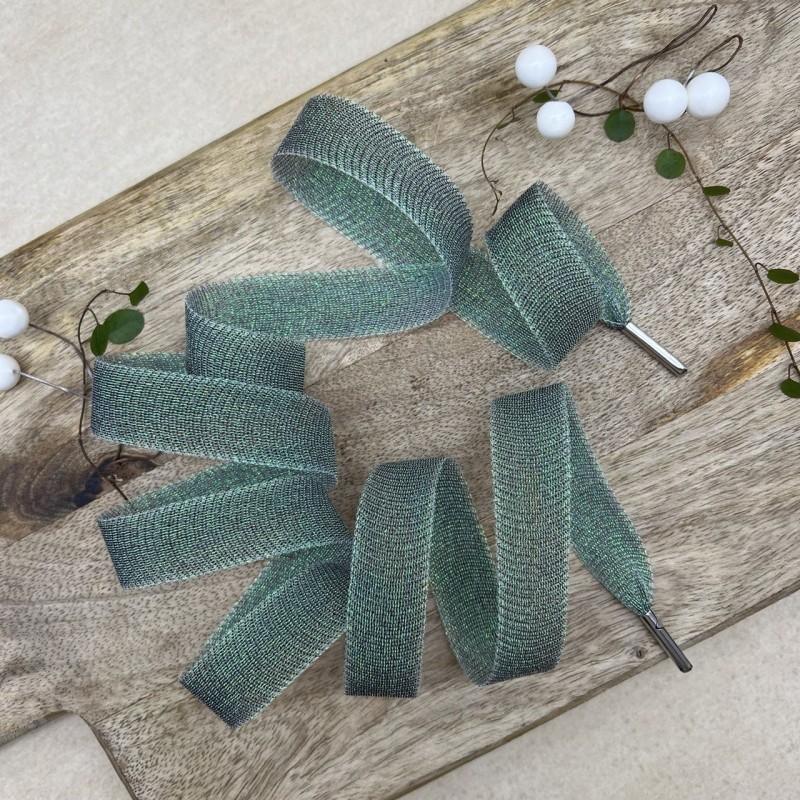 Шнурки прозрачные изумрудные с люрексом