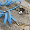 Шнурок трикотажный кругловязаный бирюзовый с серебристыми наконечниками