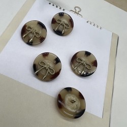 Пуговицы бежевые пластик на ножке с бантиками, 25 мм