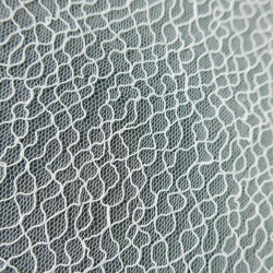 Ткань прозрачная сетка с абстрактным рисунком