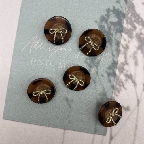 Пуговицы коричневые пластик на ножке с бантиками, 25 мм 2