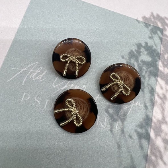 Пуговицы коричневые пластик на ножке с бантиками, 25 мм