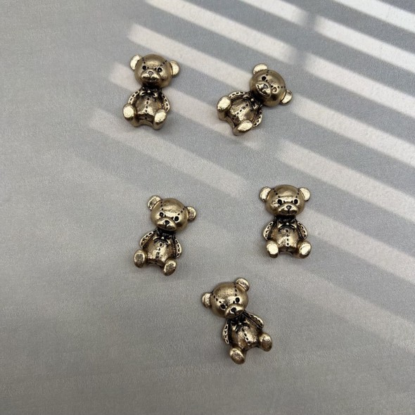 Пришивной элемент мишка цвета тёмного золота, 1.6*2.9 мм