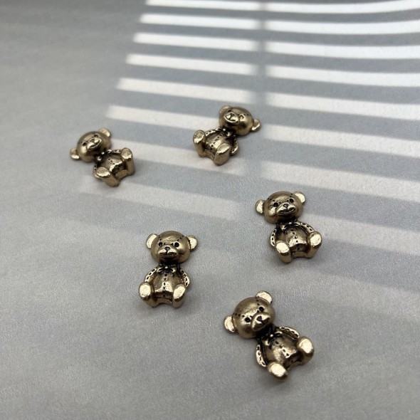 Пришивной элемент мишка цвета тёмного золота, 1.6*2.9 мм