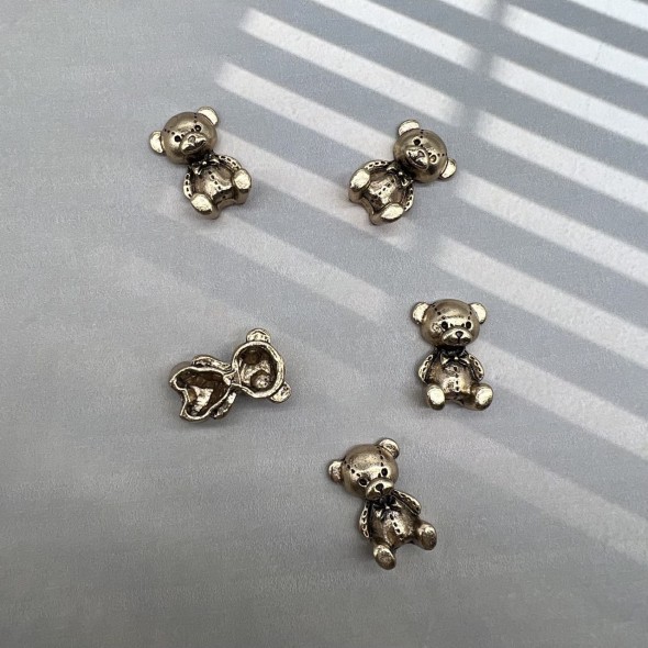 Пришивной элемент мишка цвета тёмного золота, 1.6*2.9 мм