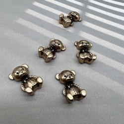 Пришивной элемент мишка цвета тёмного золота, 1.6*2.9 мм