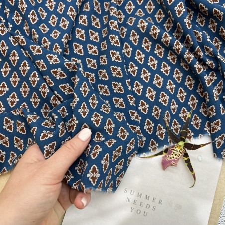 Ткань вискоза летняя с геометрическим принтом на бирюзовом фоне