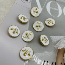 Пуговицы белые с золотистой мухой, 23 мм
